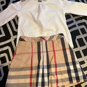 Todd little girl, Burberry skirts at. Size 2t